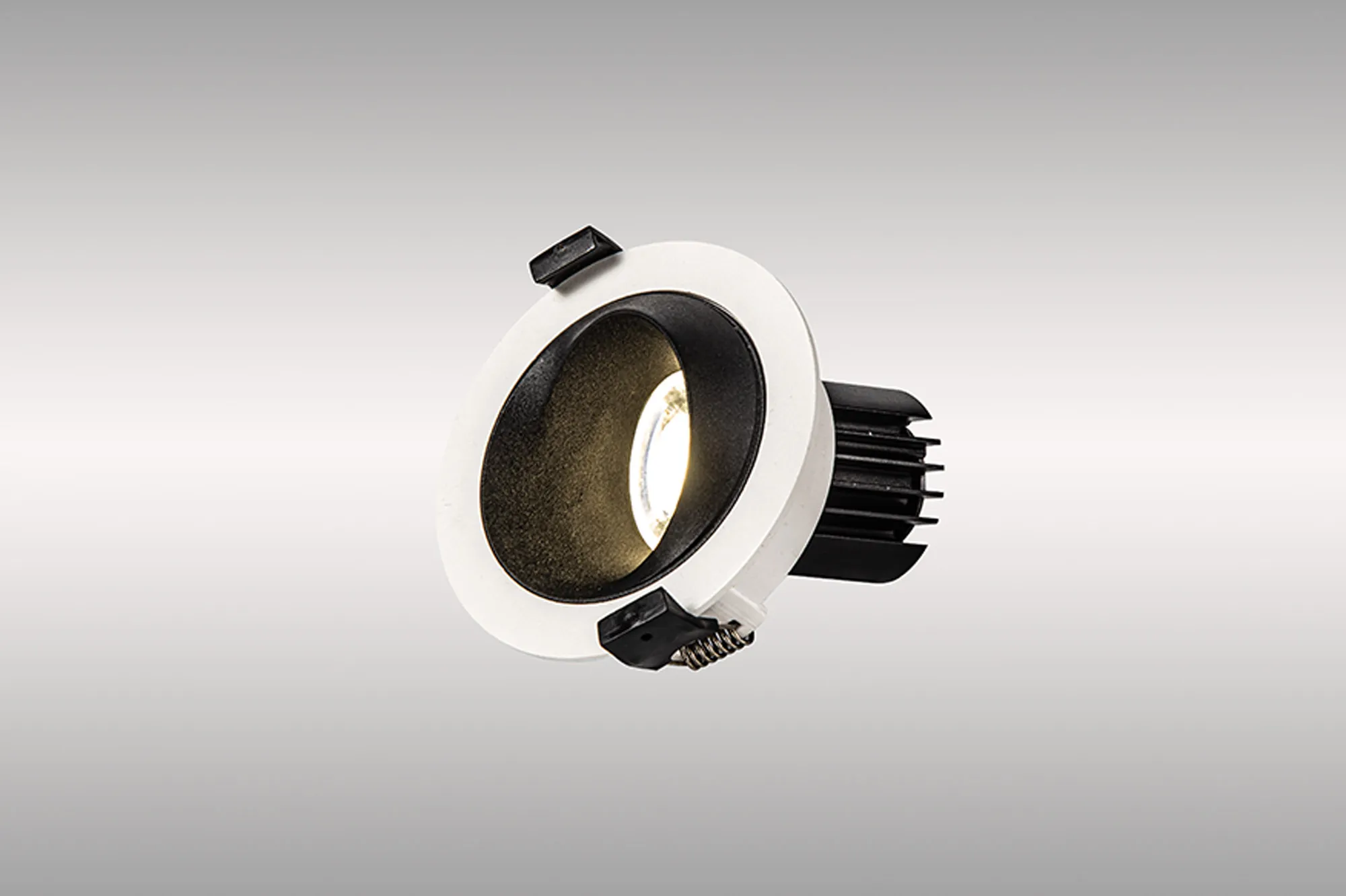 DM202359  Bonia 9 Powered by Tridonic 9W 770lm 2700K 36° LED Engine,250mA White/Black 27° Angled Round Downlight , DRIVER NOT INC. 5yrs Warranty